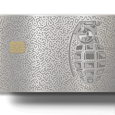 Secure metallic Lion Card with embedded chip, featuring textured design and embedded diamond-like details in the logo and grenade illustration.