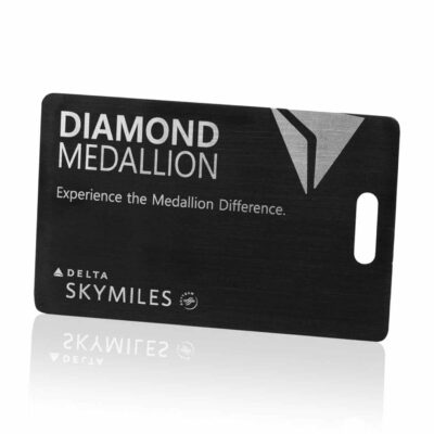 1. Black and white Delta SkyMiles Diamond Medallion loyalty card with Medallion logo and tagline "Experience the Medallion Difference.".