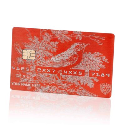 A vibrant red Lion Card featuring an intricate white line drawing of a bird perched on a blossoming tree branch, with customizable name and unique ID numbers. Perfect for loyalty programs and rewards.